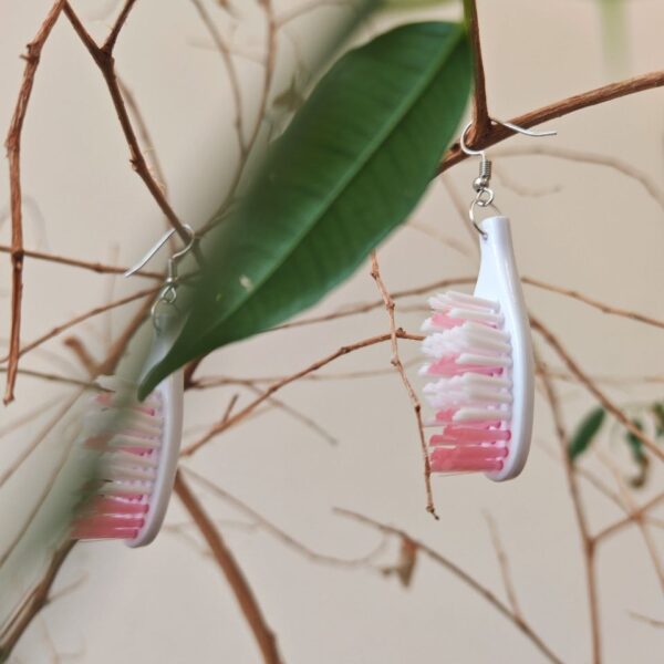 Ohrding Zahnbürste rosa