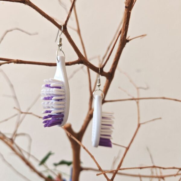 Ohrding Zahnbürste violett